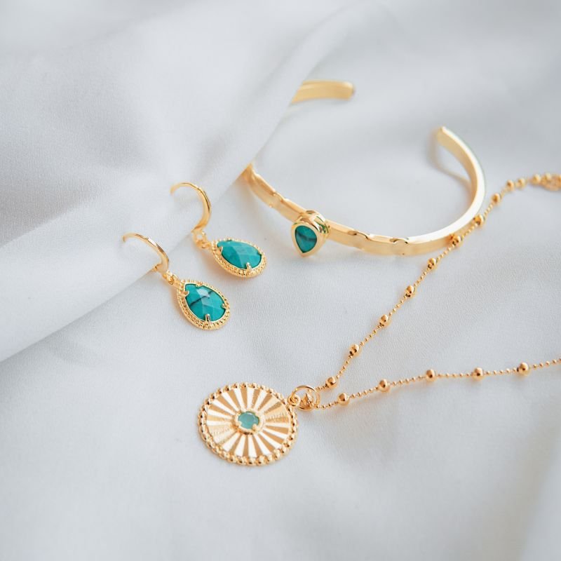 Argola turquesa oval folheada a ouro 18k