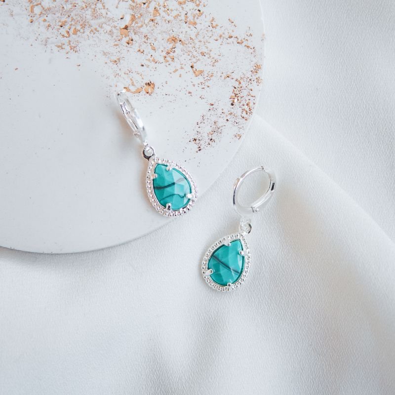 Argola turquesa oval folheada a prata