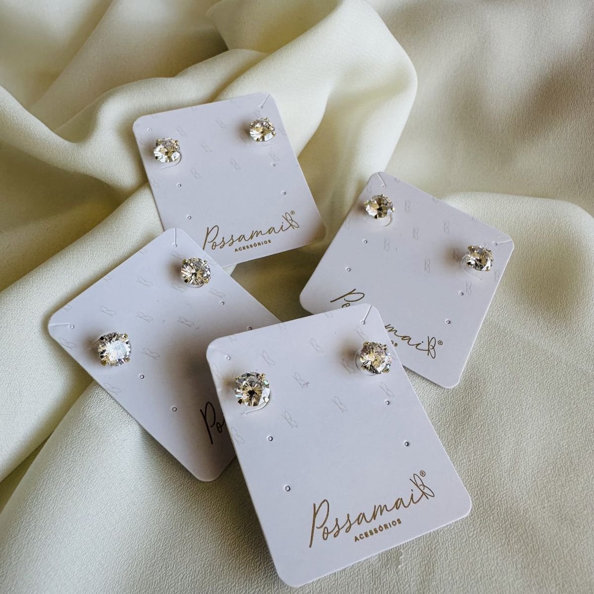 Brinco ponto de luz de zircônia folheado a ouro 18k