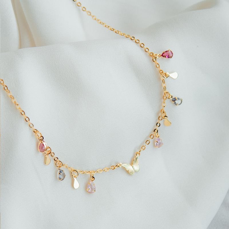 Choker de borboleta com zircônias coloridas folheada a ouro 18k