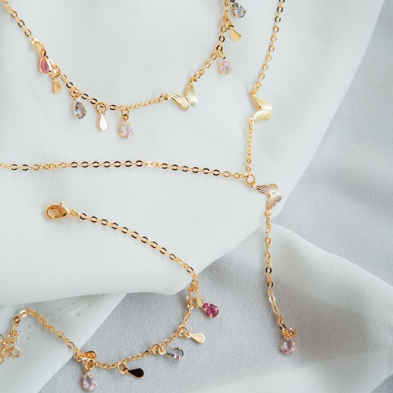 Choker de borboleta com zircônias coloridas folheada a ouro 18k