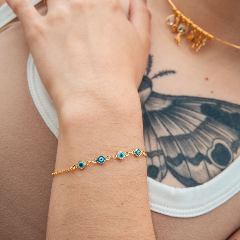 Pulseira com mini olhos gregos folheada a ouro 18k
