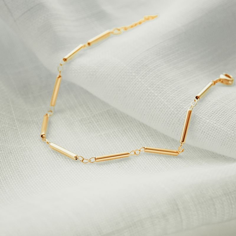 Pulseira de barrinha com elos folheada a ouro 18k