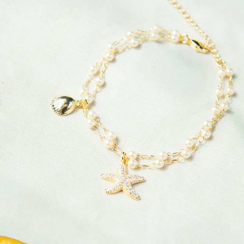 Pulseira fundo do mar folheada a ouro 18k