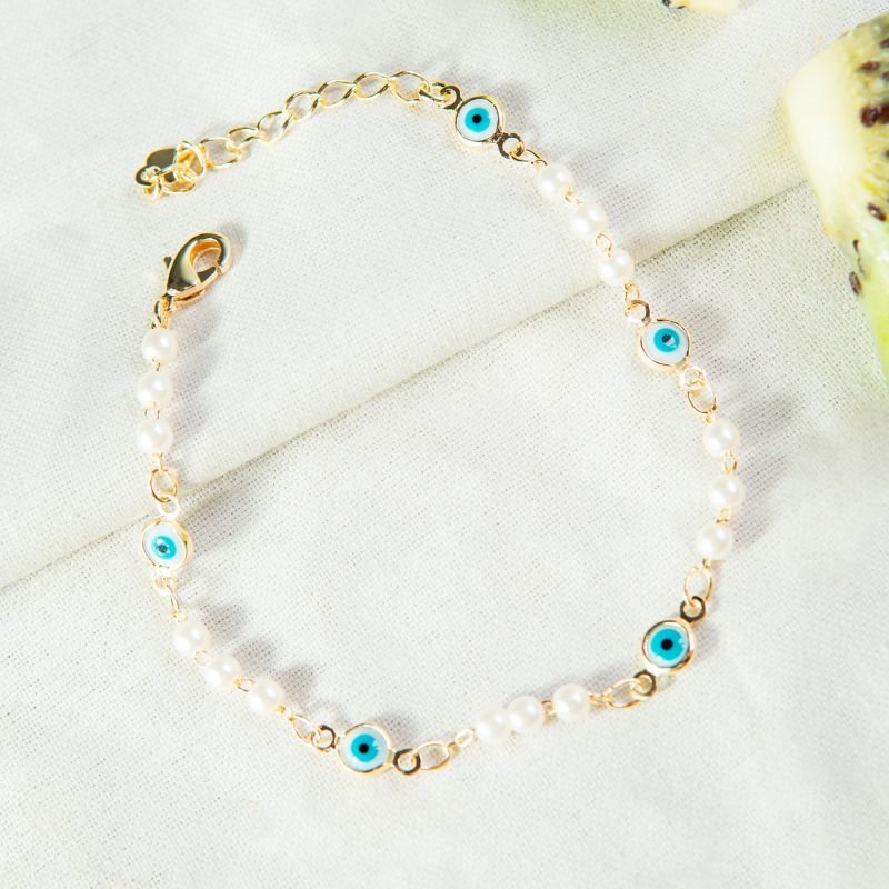 Pulseira olhinho grego pérolas folheada a ouro 18k