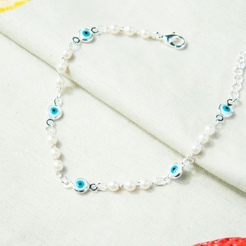 Pulseira olhinho grego pérolas folheada a prata