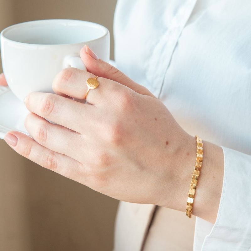 Pulseira rígida ondulada folheada a ouro 18k