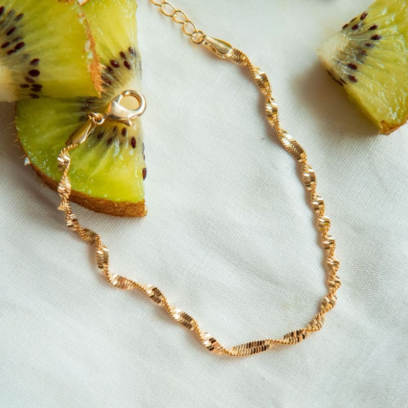 Pulseira torcida folheada a ouro 18k