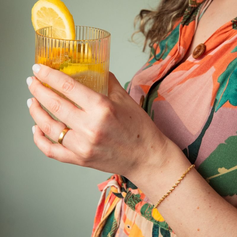 Pulseira torcida folheada a ouro 18k