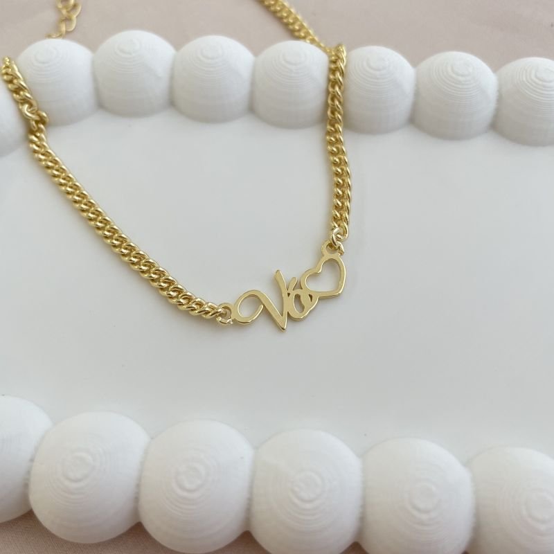 Pulseira Vó com coração vazado folheado a ouro 18k