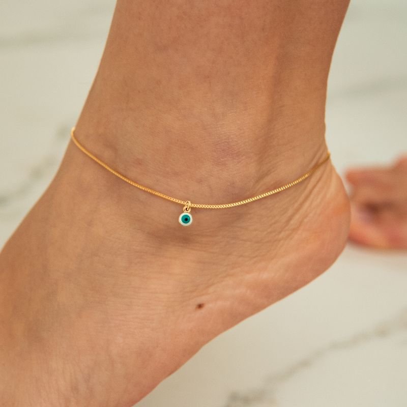 Tornozeleira de olho grego folheada a ouro 18k