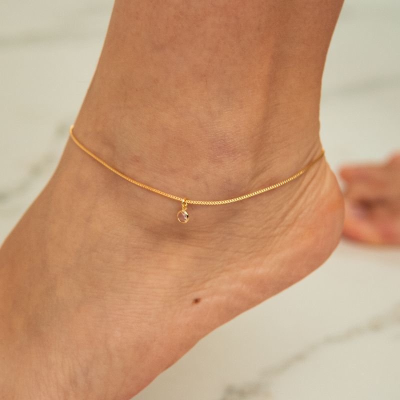 Tornozeleira ponto de luz rosa folheada a ouro 18k